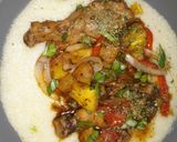 A picture of step 9 of Sweet & Spicy Pineapple chicken legs on grits.