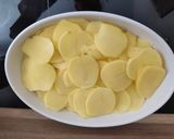 Une image de l'étape 2 de Gratin de Pommes de Terre au Jus de Lapin Chasseur.