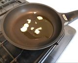 A picture of step 2 of Simple Penne with Tomato Sauce.