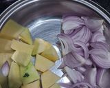 A picture of step 3 of Sambhar with idli.