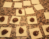 Foto del paso 3 de la receta: Bocaditos de hojaldre rellenos de cacao
