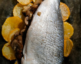 Foto del paso 5 de la receta: Dorada al horno rellena de champiñones