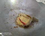 A picture of step 1 of Crab curry.