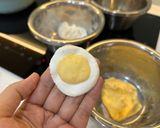 A picture of step 3 of Egg Yolk Mochi Dumplings in Ginger Syrup.