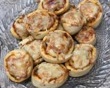 A picture of step 10 of Pizza roll ups.