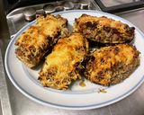 Une image de l'étape 22 de Aubergines farcies au bœuf, tomates et courgette.