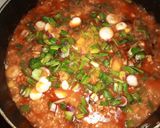 A picture of step 5 of Palm oil rice native jollof rice.
