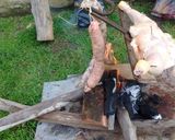 Foto del paso 2 de la receta: Asado a la cruz de pollo y chori de puro cerdo al gancho
