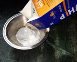 A picture of step 14 of Butterscotch rajbhog ice-cream chocolate cake.