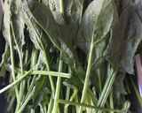 A picture of step 2 of Spinach with Century Egg.