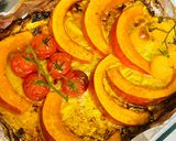 A picture of step 3 of Pumpkin in the oven with tomatoes.
