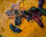 A picture of step 3 of Snake gourd theeyal Kerala style.