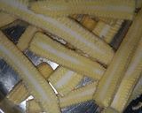 A picture of step 1 of Baby corn pakoda.
