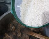 A picture of step 9 of Beef pilau with tinge of coconut.