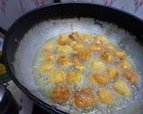 A picture of step 4 of Besan k dahi baray.