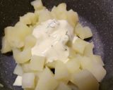 A picture of step 3 of Pan-fried sea bass on a bed of yoghurt and dill potatoes.
