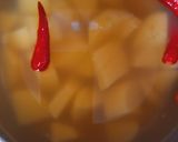 A picture of step 1 of Split yellow pigeon peas,potato curry.(potato molakoshyam).