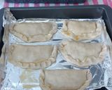Foto del paso 7 de la receta: Empanadillas de cebolla, manzana y queso al horno