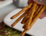 A picture of step 3 of Christmas Tree Cheese Bites.