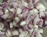 A picture of step 1 of Kadai Chicken.