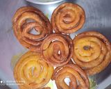 A picture of step 9 of Jalebi with rabdi milk.
