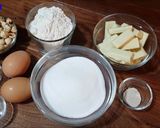 Foto del paso 1 de la receta Brownie de chocolate blanco con avellanas en panificadora