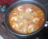 Foto del paso 6 de la receta: Arroz con pulpo, langostinos y mejillones