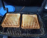 A picture of step 2 of Cheesy veg sandwich.