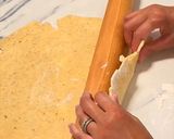 A picture of step 11 of Puttanesca galette with lemon ricotta.