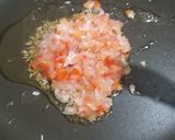 A picture of step 2 of Aloo sweet corn sabzi.