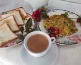 A picture of step 7 of Spring Onion omellete ! Sandwich ! With hot tea ☕.