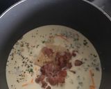 A picture of step 4 of Bacon and three cheese carbonara with strozzapreti pasta.