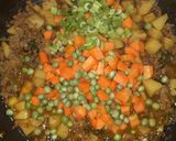 A picture of step 4 of Mixed vegetable soup.