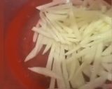 A picture of step 2 of Potato kurkure fries.