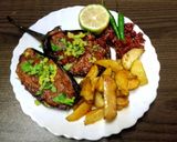 A picture of step 3 of Aurora solar spiced aubergine baked with desi baked chips.