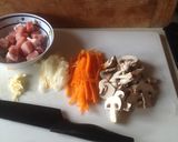 A picture of step 2 of Pork and Mushroom stir fry for one person.
