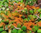 A picture of step 2 of Achari Bhindi Fry.