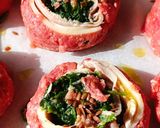 A picture of step 3 of Meat Pinwheels with Ham, Cheese, and Spinach.