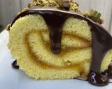 Foto del passaggio 11 della ricetta Rotolo al mandarino cioccolato e pistacchio