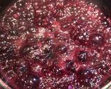 A picture of step 7 of Lemon Pepper Chicken with a Blueberry Orange Wine Sauce.