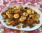 Une image de l'étape 9 de Courgettes jaunes aux tomates, poivrons verts et herbes de Provence.