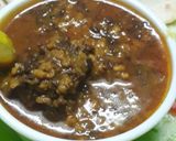 A picture of step 6 of Urad dal and nonya saag gosht.