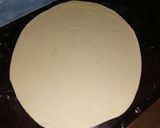 A picture of step 3 of Soft coconut layered chapati.