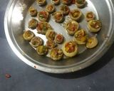 A picture of step 6 of Cheesy stuffed mushrooms :).