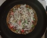 A picture of step 6 of Paratha Pizza.