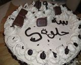 صورة لخطوة 7 من وصفة كعكة عيد ميلاد