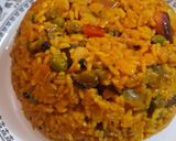 A picture of step 6 of Kathyawadi masala vegetable khichadi with masala curd, papad and 🌶.