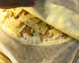Foto del paso 8 de la receta: Rollo de Hojaldre de salmón y queso