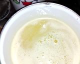 A picture of step 1 of Orange-banana smoothie.