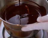 A picture of step 11 of Glossy! Creamy Chocolate Mousse Cake.
